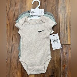 Nike Infant Onesies set. Three pieces